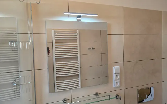 Rekonstrukce koupelny v domě Okál 117